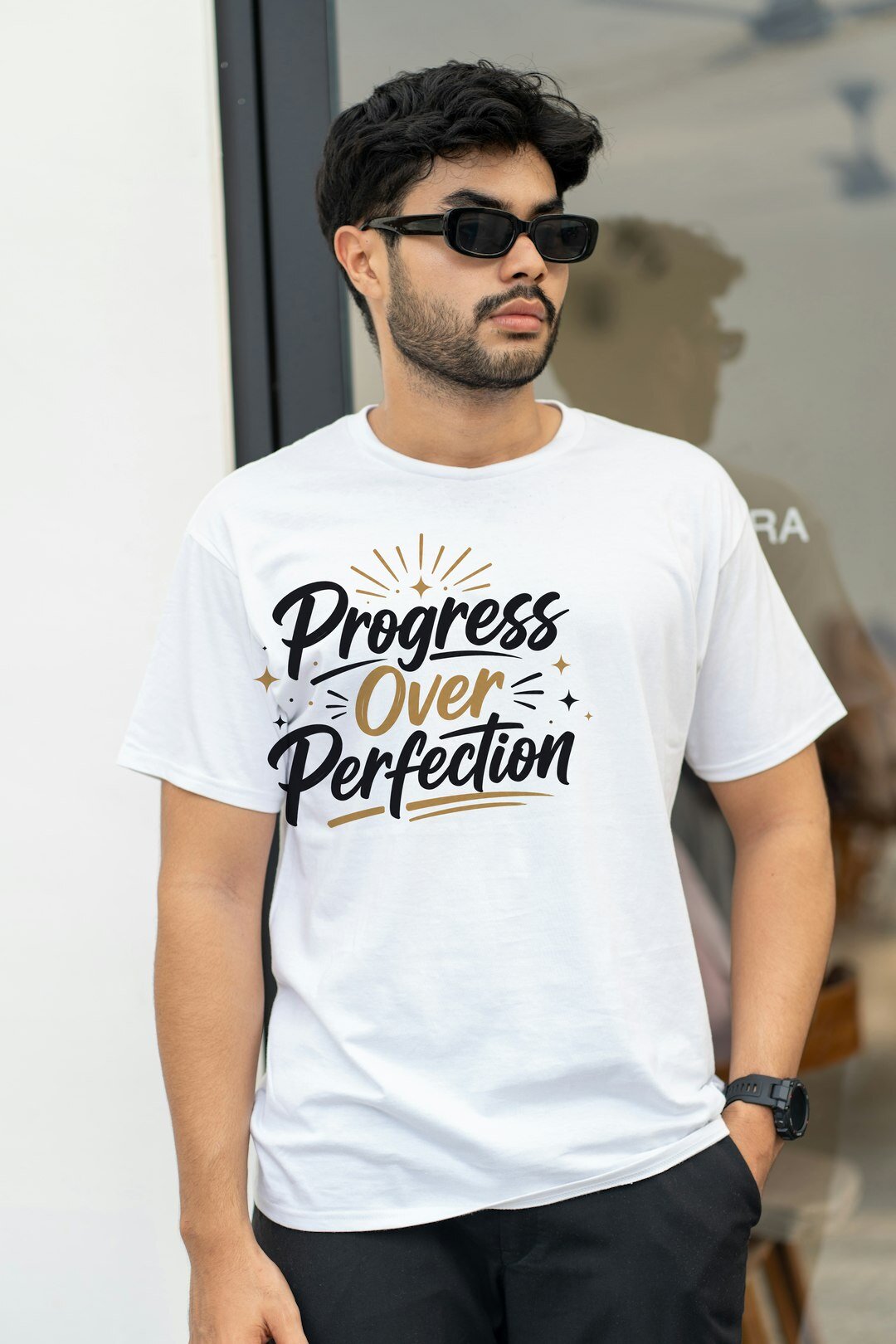 Progress Over Perfection - t-shirt model mockup (man-street) Model wearing a t-shirt with the "Progress Over Perfection" design