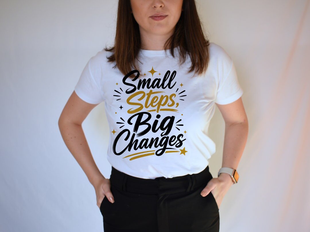 Small Steps, Big Changes - t-shirt model mockup (woman-tee) Model wearing a t-shirt with the "Small Steps, Big Changes" design
