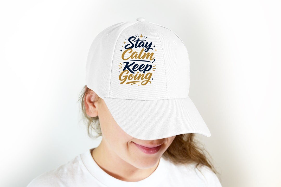 Stay Calm, Keep Going - cap model mockup (woman-cap) Model wearing a baseball cap with the "Stay Calm, Keep Going" design